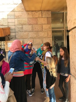 Girls Swarmed by Locals for Photo op